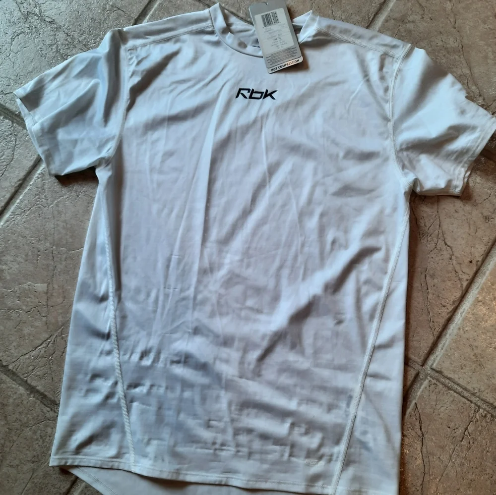 New RBK white compression shirt XL youth play dry sports